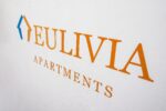 EULIVIA Apartments wall logo
